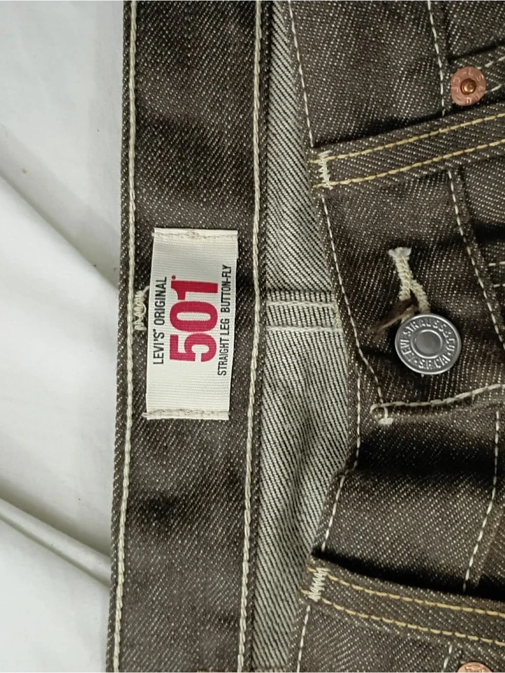 Levi's brown straight-leg jeans with contrast stitching